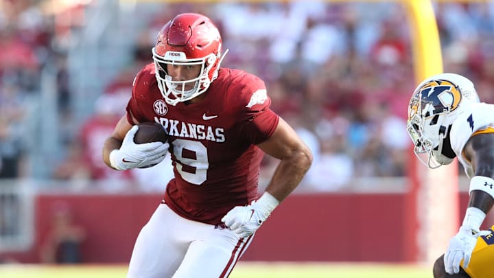 Sep 9, 2023; Fayetteville, Arkansas, USA; Arkansas Razorbacks tight end Luke Hasz (9) runs after a catch during the fourth quarter against the Kent State Golden Flashes at Donald W. Reynolds Razorback Stadium. Arkansas won 28-6. Mandatory Credit: Nelson Chenault-USA TODAY Sports