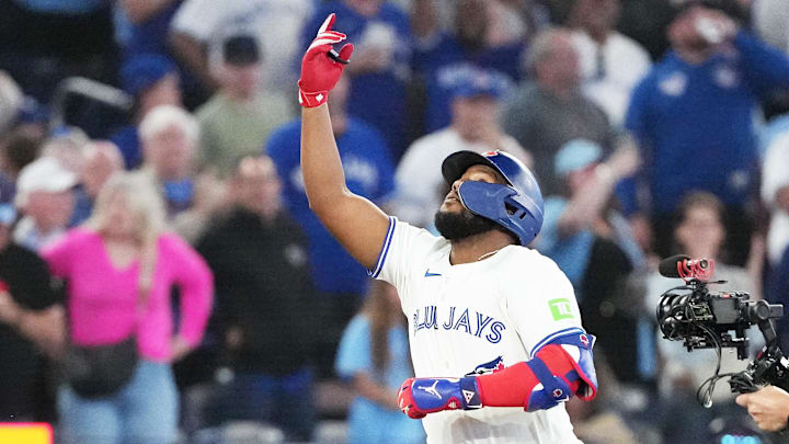 Sep 3, 2024; Toronto, Ontario, CAN; Toronto Blue Jays first base Vladimir Guerrero Jr. (27) celebrates hitting a two-run home run against the Philadelphia Phillies during the sixth inning at Rogers Centre. Sep 3, 2024; Toronto, Ontario, CAN; Toronto Blue Jays first base Vladimir Guerrero Jr. (27) celebrates hitting a two-run home run against the Philadelphia Phillies during the sixth inning at Rogers Centre.