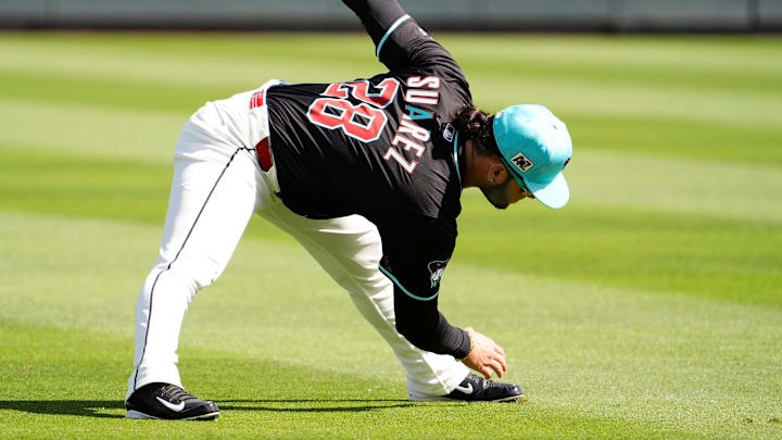 Arizona Diamondbacks' third baseman Eugenio Suarez stretches before playing the Kansas City Royals during a spring training game at Salt River Fields at Talking Stick on Feb. 28, 2025, in Scottsdale. Arizona Diamondbacks' third baseman Eugenio Suarez stretches before playing the Kansas City Royals during a spring training game at Salt River Fields at Talking Stick on Feb. 28, 2025, in Scottsdale.