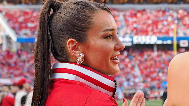 Kristin Juszczyk wears a custom-made jacket in a show of her support for her husband, San Francisco 49ers fullback Kyle Juszczyk.