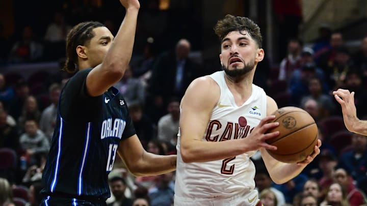 Oct 12, 2023; Cleveland, Ohio, USA; Cleveland Cavaliers guard Ty Jerome (2) drives to the basket against Orlando Magic guard Jett Howard (13) during the second half at Rocket Mortgage FieldHouse. Mandatory Credit: Ken Blaze-Imagn Images