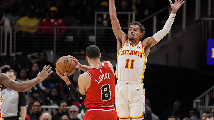 Atlanta Hawks guard Trae Young (11) defends against Chicago Bulls guard Zach LaVine (8) during the first half at State Farm Arena. Mandatory Credit: Dale Zanine-Imagn Images