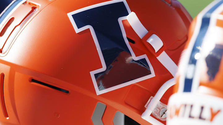 Oct 1, 2022; Madison, Wisconsin, USA;  Illinois Fighting Illini logo on a helmet during warmups prior to the game against the Wisconsin Badgers at Camp Randall Stadium. Mandatory Credit: Jeff Hanisch-Imagn Images