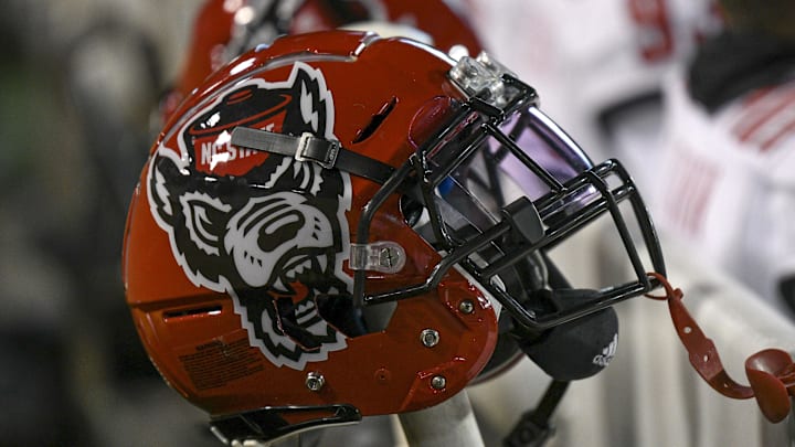 Nov 13, 2021; Winston-Salem, North Carolina, USA; A North Carolina State Wolfpack helmet seen on the sideline during the second half against the Wake Forest Demon Deacons at Truist Field. Mandatory Credit: William Howard-Imagn Images