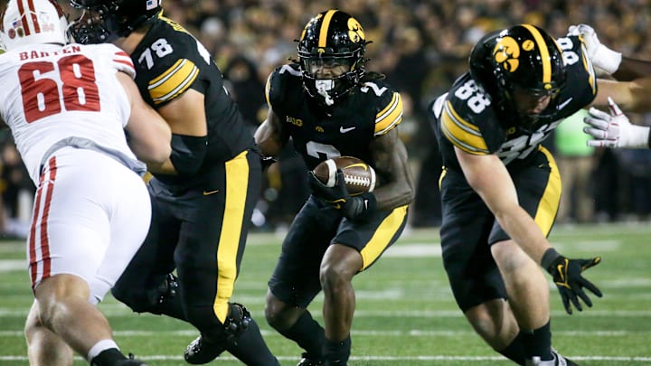 Iowa running back Kaleb Johnson (2) carries the ball against Wisconsin Saturday, Nov. 2, 2024 at Kinnick Stadium in Iowa City, Iowa.
