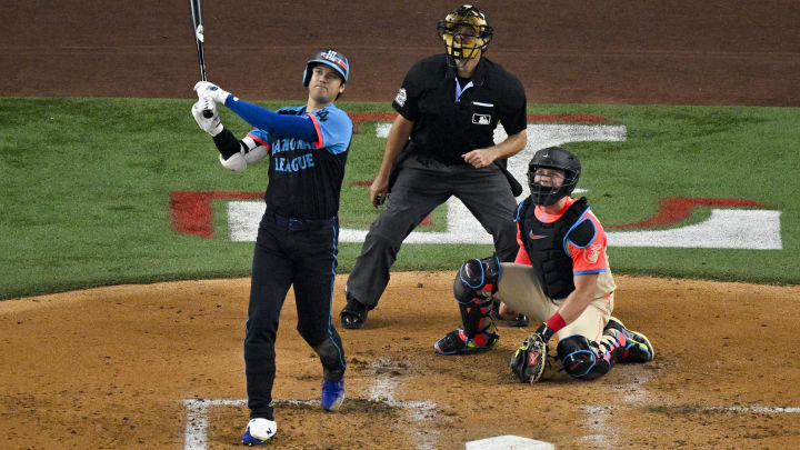 Jul 16, 2024; Arlington, Texas, USA; National League designated hitter Shohei Ohtani of the Los Angeles Dodgers (17) hits a three run home run against the American League during the third inning of the 2024 MLB All-Star game at Globe Life Field. Mandatory Credit: Jerome Miron-USA TODAY Sports