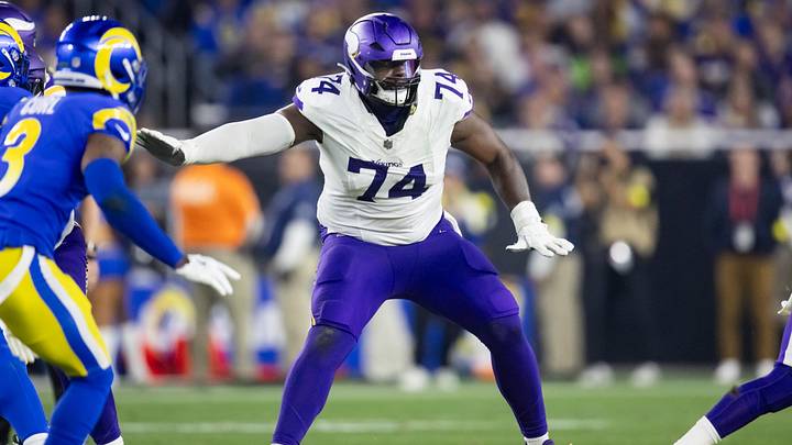 Jan 13, 2025; Glendale, AZ, USA; Minnesota Vikings tackle Cam Robinson (74) against the Los Angeles Rams during an NFC wild card game at State Farm Stadium. Jan 13, 2025; Glendale, AZ, USA; Minnesota Vikings tackle Cam Robinson (74) against the Los Angeles Rams during an NFC wild card game at State Farm Stadium.