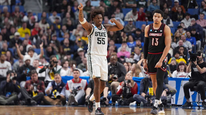 Mar 21, 2026; Buffalo, NY, USA; Michigan State Spartans forward Coen Carr (55) reacts after defeating the Louisville Cardinals during a second round game of the men's 2026 NCAA Tournament at Keybank Center. Mandatory Credit: Gregory Fisher-Imagn Images