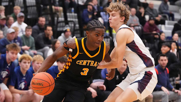 West Allis Central's Yusef Gray Jr., left, breaks past Brookfield East's Zeke Sawall (3) during the game at Brookfield East High School, in Brookfield, Wisconsin, Jan. 22, 2026. West Allis Central won the game, 91-56.