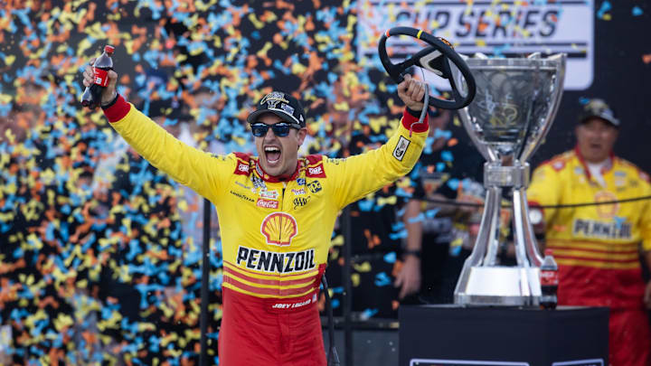 Joey Logano captured his third NASCAR Cup title at Phoenix Raceway on Sunday. 