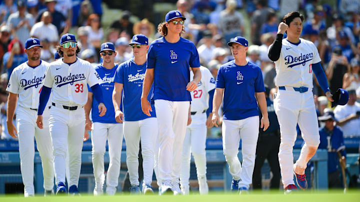 Jul 25, 2024; Los Angeles, California, USA; Los Angeles Dodgers pitcher Blake Treinen (49) outfielder James Outman (33) pitcher Gavin Stone (35) pitcher River Ryan (70) pitcher Tyler Glasnow (31) catcher Will Smith (16) and designated hitter Shohei Ohtani (17) celebrate the victory against the San Francisco Giants at Dodger Stadium. Mandatory Credit: Gary A. Vasquez-Imagn Images