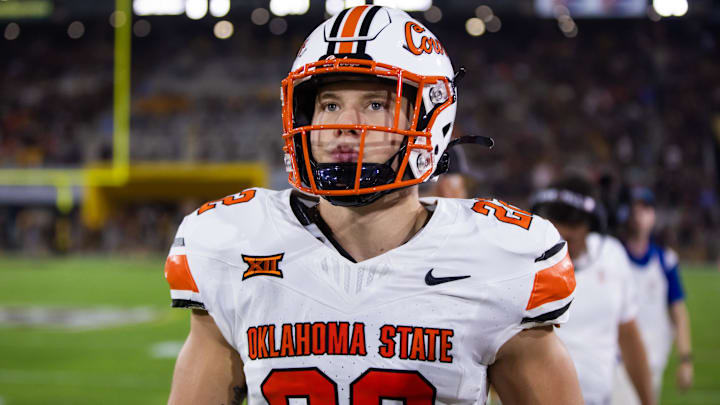 Sep 9, 2023; Tempe, Arizona, USA; Oklahoma State Cowboys linebacker Jeff Roberson (22) against the Arizona State Sun Devils at Mountain America Stadium. Mandatory Credit: Mark J. Rebilas-Imagn Images Sep 9, 2023; Tempe, Arizona, USA; Oklahoma State Cowboys linebacker Jeff Roberson (22) against the Arizona State Sun Devils at Mountain America Stadium. Mandatory Credit: Mark J. Rebilas-Imagn Images