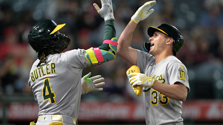 Jun 9, 2025; Anaheim, California, USA; Athletics center fielder JJ Bleday (33) celebrates a two run home run with right fielder Lawrence Bulter (4) in the eighth inning against the Los Angeles Angels at Angel Stadium. Mandatory Credit: Jayne Kamin-Oncea-Imagn Images Jun 9, 2025; Anaheim, California, USA; Athletics center fielder JJ Bleday (33) celebrates a two run home run with right fielder Lawrence Bulter (4) in the eighth inning against the Los Angeles Angels at Angel Stadium. Mandatory Credit: Jayne Kamin-Oncea-Imagn Images