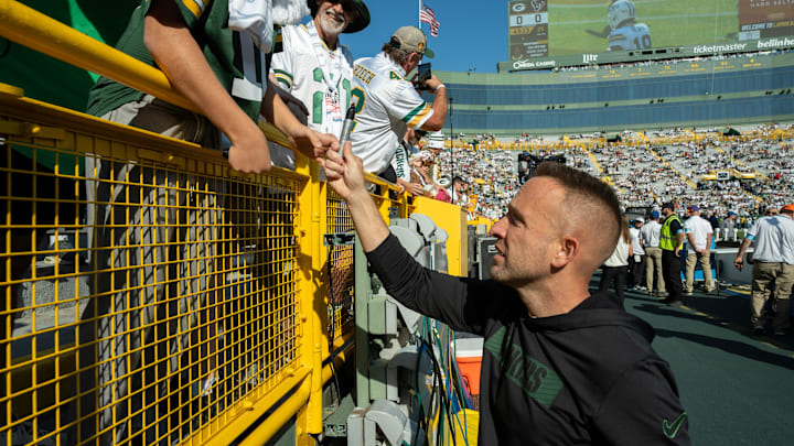 Green Bay Packers defensive coordinator Jeff Hafley talks with fans before their game against the Houston Texans Sunday, October 20, 2024 at Lambeau Field in Green Bay, Wisconsin. Green Bay Packers defensive coordinator Jeff Hafley talks with fans before their game against the Houston Texans Sunday, October 20, 2024 at Lambeau Field in Green Bay, Wisconsin.