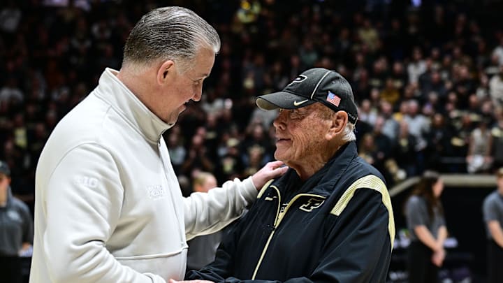 Purdue Boilermakers head coach Matt Painter shakes hands with former Purdue coach Gene Keady Purdue Boilermakers head coach Matt Painter shakes hands with former Purdue coach Gene Keady