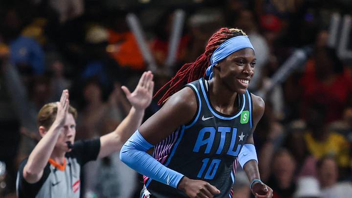 Sep 5, 2025; College Park, Georgia, USA; Atlanta Dream guard Rhyne Howard (10) smiles after shooting a three point shot against the Los Angeles Sparks during the first quarter at Gateway Center Arena at College Park. Mandatory Credit: Jordan Godfree-Imagn Images