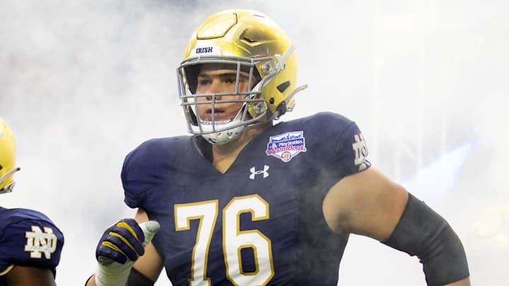 Jan 1, 2022; Glendale, Arizona, USA; Notre Dame Fighting Irish offensive lineman Joe Alt (76) against the Oklahoma State Cowboys in the 2022 Fiesta Bowl at State Farm Stadium.
