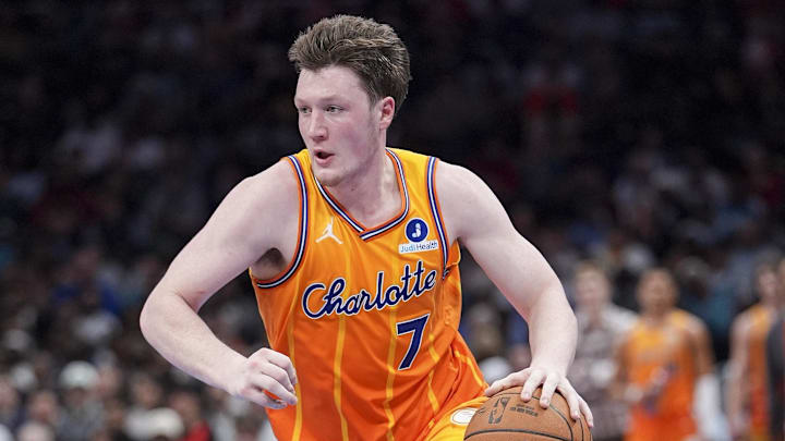 Feb 19, 2026; Charlotte, North Carolina, USA;  Charlotte Hornets guard Kon Knueppel (7) moves the ball against the Houston Rockets during the second  quarter at Spectrum Center. Mandatory Credit: Jim Dedmon-Imagn Images