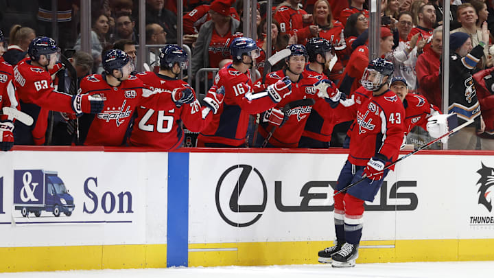 Dec 14, 2024; Washington, District of Columbia, USA; Washington Capitals right wing Tom Wilson (43) celebrates with teammates after scoring a goal against the Buffalo Sabres in the second period at Capital One Arena. Mandatory Credit: Geoff Burke-Imagn Images