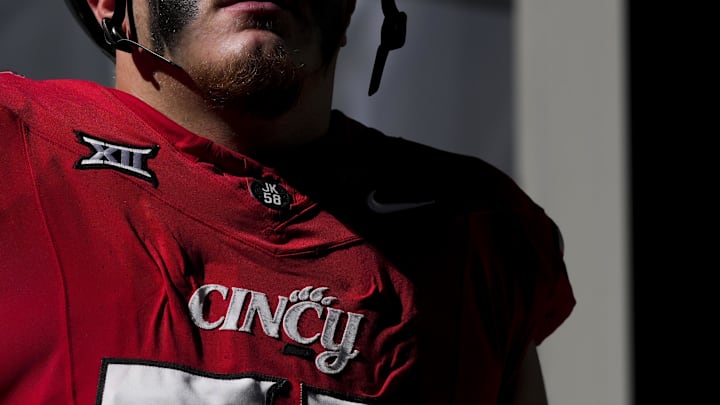 Oct 11, 2025; Cincinnati, Ohio, USA; The Cincinnati logo is seen on a player’s jersey before the game between the UCF Knights and the Cincinnati Bearcats at Nippert Stadium. Mandatory Credit: Aaron Doster-Imagn Images