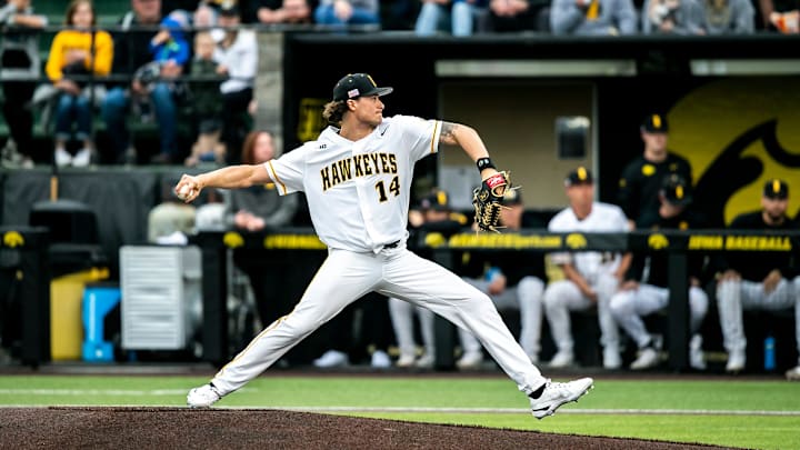Iowa's Brody Brecht delivers a pitch during a NCAA Big Ten Conference baseball game against Ohio