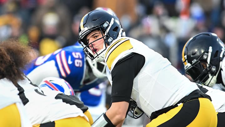 Jan 15, 2024; Orchard Park, New York, USA; Pittsburgh Steelers quarterback Mason Rudolph (2) at the line of scrimmage