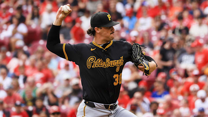 Sep 22, 2024; Cincinnati, Ohio, USA; Pittsburgh Pirates starting pitcher Paul Skenes (30) pitches against the Cincinnati Reds in the first inning at Great American Ball Park. Mandatory Credit: Katie Stratman-Imagn Images