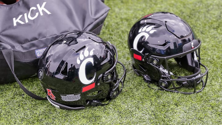 Oct 30, 2021; New Orleans, Louisiana, USA;  Cincinnati Bearcats helmets on the ground during the game against Tulane Green Wave during the second half at Yulman Stadium. Mandatory Credit: Stephen Lew-Imagn Images