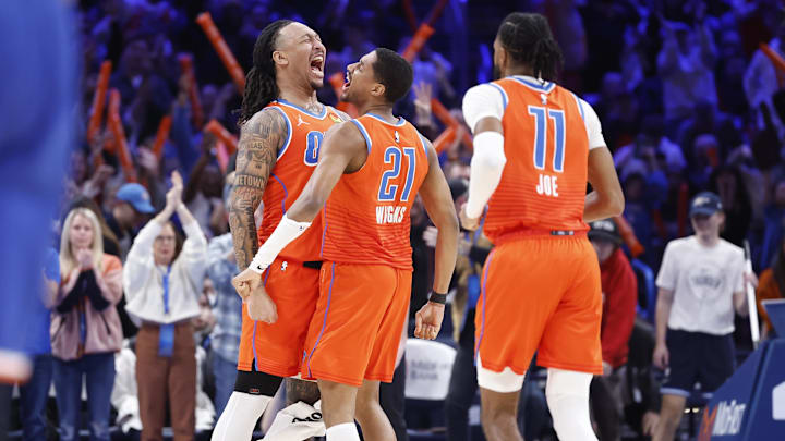 Jan 3, 2025; Oklahoma City, Oklahoma, USA; Oklahoma City Thunder forward Jaylin Williams (6) and guard Aaron Wiggins (21) celebrate after scoring against the New York Knicks during the second half at Paycom Center. Mandatory Credit: Alonzo Adams-Imagn Images
