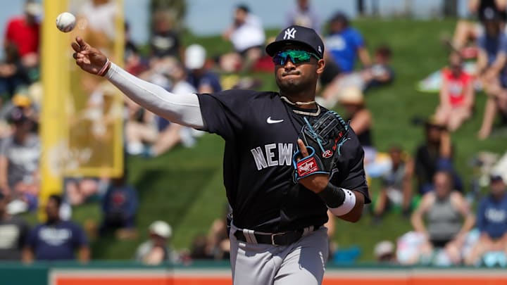 Mar 23, 2024; Lakeland, Florida, USA; New York Yankees shortstop Roderick Arias (54) throws to first during the first inning against the Detroit Tigers at Publix Field at Joker Marchant Stadium. Mandatory Credit: Mike Watters-Imagn Images