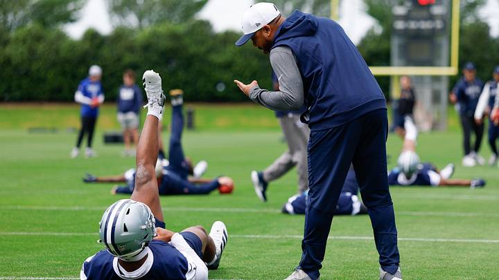 Dallas Cowboys defensive back Caleb Downs and defensive coordinator Christian Parker. Dallas Cowboys defensive back Caleb Downs and defensive coordinator Christian Parker.