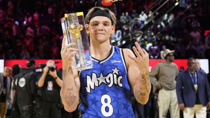 Feb 15, 2025; San Francisco, CA, USA; Osceola Magic guard Mac McClung celebrates with the trophy after winning the slam dunk competition during All Star Saturday Night ahead of the 2025 NBA All Star Game at Chase Center. Mandatory Credit: Kyle Terada-Imagn Images Feb 15, 2025; San Francisco, CA, USA; Osceola Magic guard Mac McClung celebrates with the trophy after winning the slam dunk competition during All Star Saturday Night ahead of the 2025 NBA All Star Game at Chase Center. Mandatory Credit: Kyle Terada-Imagn Images