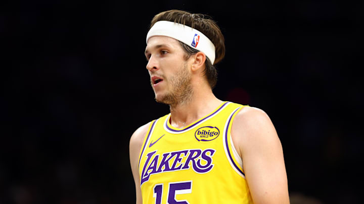 Oct 14, 2025; Phoenix, Arizona, USA; Los Angeles Lakers guard Austin Reaves (15) against the Phoenix Suns during an NBA preseason game at Mortgage Matchup Center. Mandatory Credit: Mark J. Rebilas-Imagn Images

