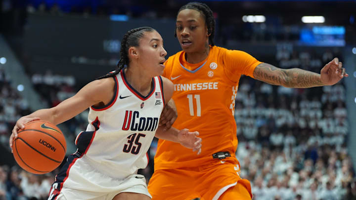 Feb 1, 2026; Hartford, Connecticut, USA; UConn Huskies guard Azzi Fudd (35) drives the ball against Tennessee Volunteers forward Zee Spearman (11) in the first half at PeoplesBank Arena. Mandatory Credit: David Butler II-Imagn Images