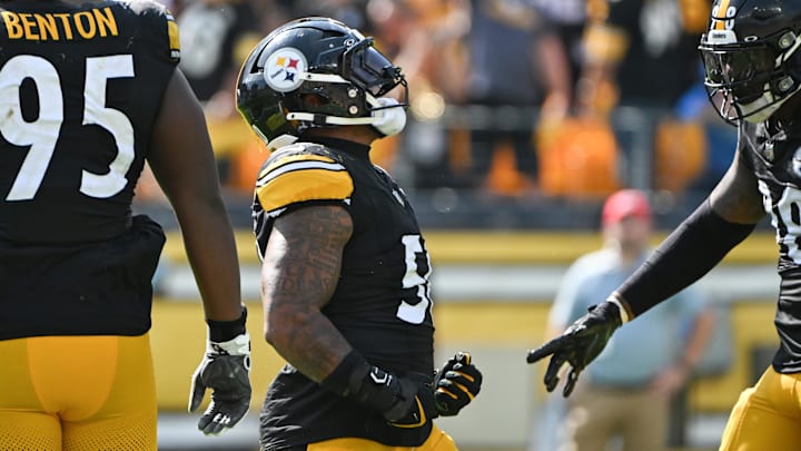 Sep 22, 2024; Pittsburgh, Pennsylvania, USA; Pittsburgh Steelers linebacker Elandon Roberts (50) celebrates after sacking Los Angeles Chargers quarterback Justin Herbert (10) during the third quarter at Acrisure Stadium. Mandatory Credit: Barry Reeger-Imagn Images