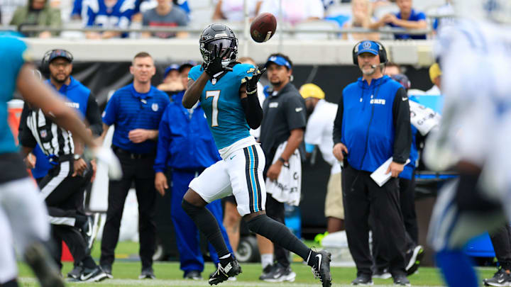 Jacksonville Jaguars wide receiver Brian Thomas Jr. (7) hauls in a reception en route to a touchdown during the second quarter of an NFL football matchup Sunday, Oct. 6, 2024 at EverBank Stadium in Jacksonville, Fla. The Jaguars edged the Colts on a field goal 37-34. [Corey Perrine/Florida Times-Union]