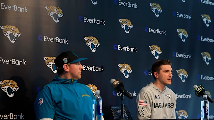 Jacksonville Jaguars head coach Liam Coen, left, listens as general manager James Gladstone answers questions from the media during a press conference at Miller Electric Center Tuesday, April 15, 2025 in Jacksonville, Fla. [Corey Perrine/Florida Times-Union]