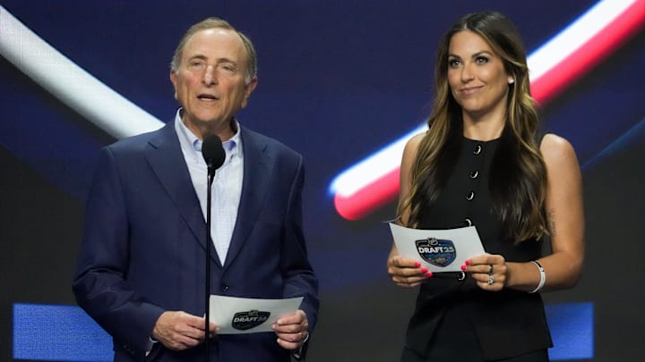 Jun 27, 2025; Los Angeles, California, USA; NHL Commissioner Gary Bettman and Meredith Gaudreau announce the 20th overall pick for the Columbus Blue Jackets in the first round of the 2025 NHL Draft at Peacock Theater. Mandatory Credit: Kirby Lee-Imagn Images