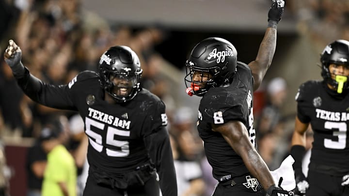 Oct 26, 2024; College Station, Texas, USA; Texas A&M Aggies running back Le'Veon Moss (8) reacts after scoring a touchdown against the LSU Tigers in the fourth quarter at Kyle Field. Mandatory Credit: Maria Lysaker-Imagn Images. 