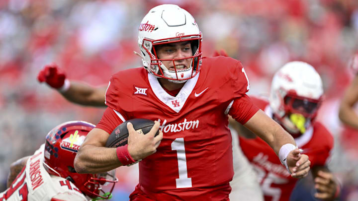 Oct 18, 2025; Houston, Texas, USA; Houston Cougars quarterback Conner Weigman (1) runs the ball into the end zone for a touchdown during the second quarter against the Arizona Wildcats at TDECU Stadium. Mandatory Credit: Maria Lysaker-Imagn Images 