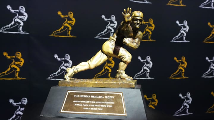 Jan 7, 2024; Houston, TX, USA; A Heisman Trophy at the College Football Playoff Fan Central at the George R. Brown Convention Center. Mandatory Credit: Kirby Lee-USA TODAY Sports Jan 7, 2024; Houston, TX, USA; A Heisman Trophy at the College Football Playoff Fan Central at the George R. Brown Convention Center. Mandatory Credit: Kirby Lee-USA TODAY Sports