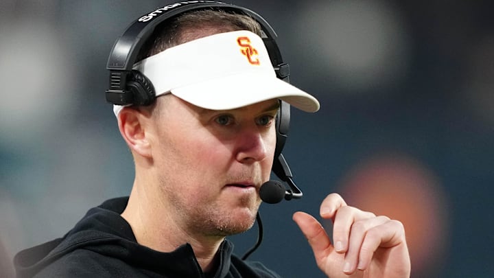Dec 27, 2024; Las Vegas, NV, USA; Southern California Trojans head coach Lincoln Riley reacts against the Texas A&M Aggies in the second half at Allegiant Stadium. 