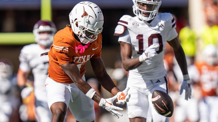 Sep 28, 2024; Austin, Texas, USA;  Texas Longhorns wide receiver Johntay Cook II (1) reaches out his hands as a pass slips through his reach as the Texas Longhorns take on the Mississippi State Bulldogs at Darrell K Royal-Texas Memorial Stadium. Mandatory Credit: Mikala Compton/USA TODAY Network via Imagn Images