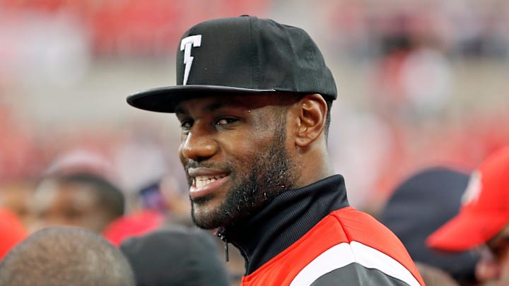 LeBron James takes in the warmups of the Virginia Tech Hokies and Ohio State Buckeyes game in Ohio Stadium on September 6, 2014. LeBron James takes in the warmups of the Virginia Tech Hokies and Ohio State Buckeyes game in Ohio Stadium on September 6, 2014.