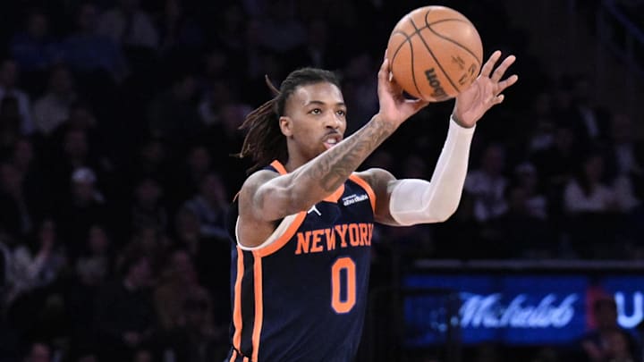 Apr 1, 2025; New York, New York, USA; New York Knicks guard Delon Wright (0) passes the ball against the Philadelphia 76ers during the first half at Madison Square Garden. Mandatory Credit: John Jones-Imagn Images