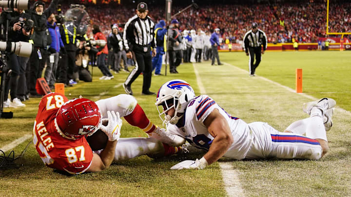 Jan 23, 2022; Kansas City, Missouri, USA; Kansas City Chiefs tight end Travis Kelce (87) scores the game winning touchdown against the Buffalo Bills during overtime in the AFC Divisional playoff football game at GEHA Field at Arrowhead Stadium. Mandatory Credit: Jay Biggerstaff-Imagn Images Jan 23, 2022; Kansas City, Missouri, USA; Kansas City Chiefs tight end Travis Kelce (87) scores the game winning touchdown against the Buffalo Bills during overtime in the AFC Divisional playoff football game at GEHA Field at Arrowhead Stadium. Mandatory Credit: Jay Biggerstaff-Imagn Images