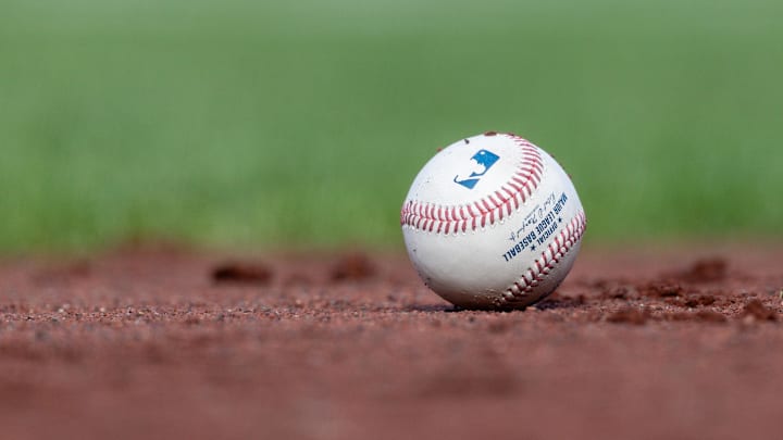 Jul 27, 2025; San Francisco, California, USA; A MLB baseball sits on the infield during the game between the San Francisco Giants and the New York Mets at Oracle Park. Mandatory Credit: Bob Kupbens-Imagn Images