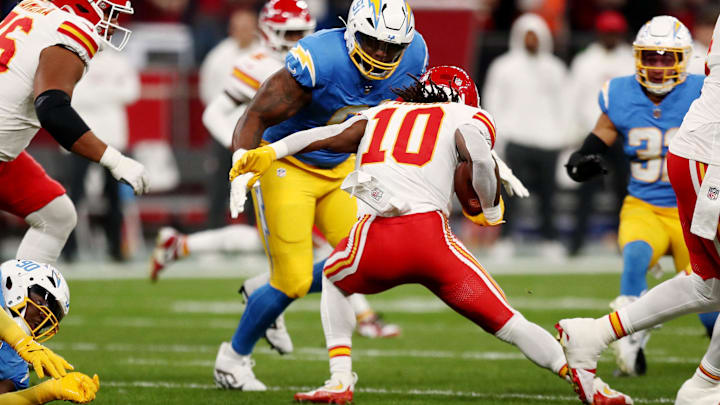 [US, Mexico & Canada customers only] Sep 5, 2025; Sao Paulo, BRAZIL;  Kansas City Chiefs running back Isiah Pacheco (10) runs against Los Angeles Chargers defensive tackle Da'Shawn Hand (91) in the first quarter during a NFL game at Corinthians Arena. Mandatory Credit: Jean Carniel/Reuters via Imagn Images