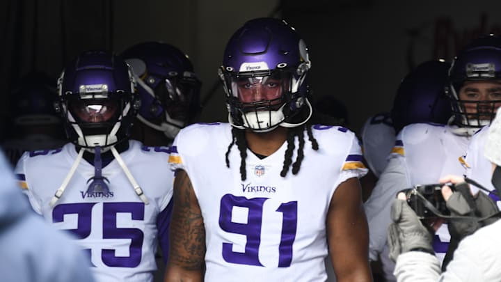 Jan 8, 2023; Chicago, Illinois, USA;  Minnesota Vikings linebacker Patrick Jones II (91) enters the field before the first half against the  Chicago Bears at Soldier Field. Mandatory Credit: Matt Marton-Imagn Images