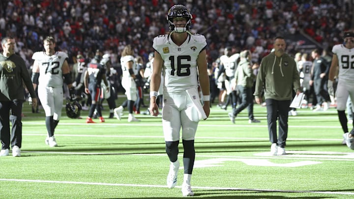 Nov 9, 2025; Houston, Texas, USA; Jacksonville Jaguars quarterback Trevor Lawrence (16) walks off the field after the game against the Houston Texans at NRG Stadium. Mandatory Credit: Troy Taormina-Imagn Images